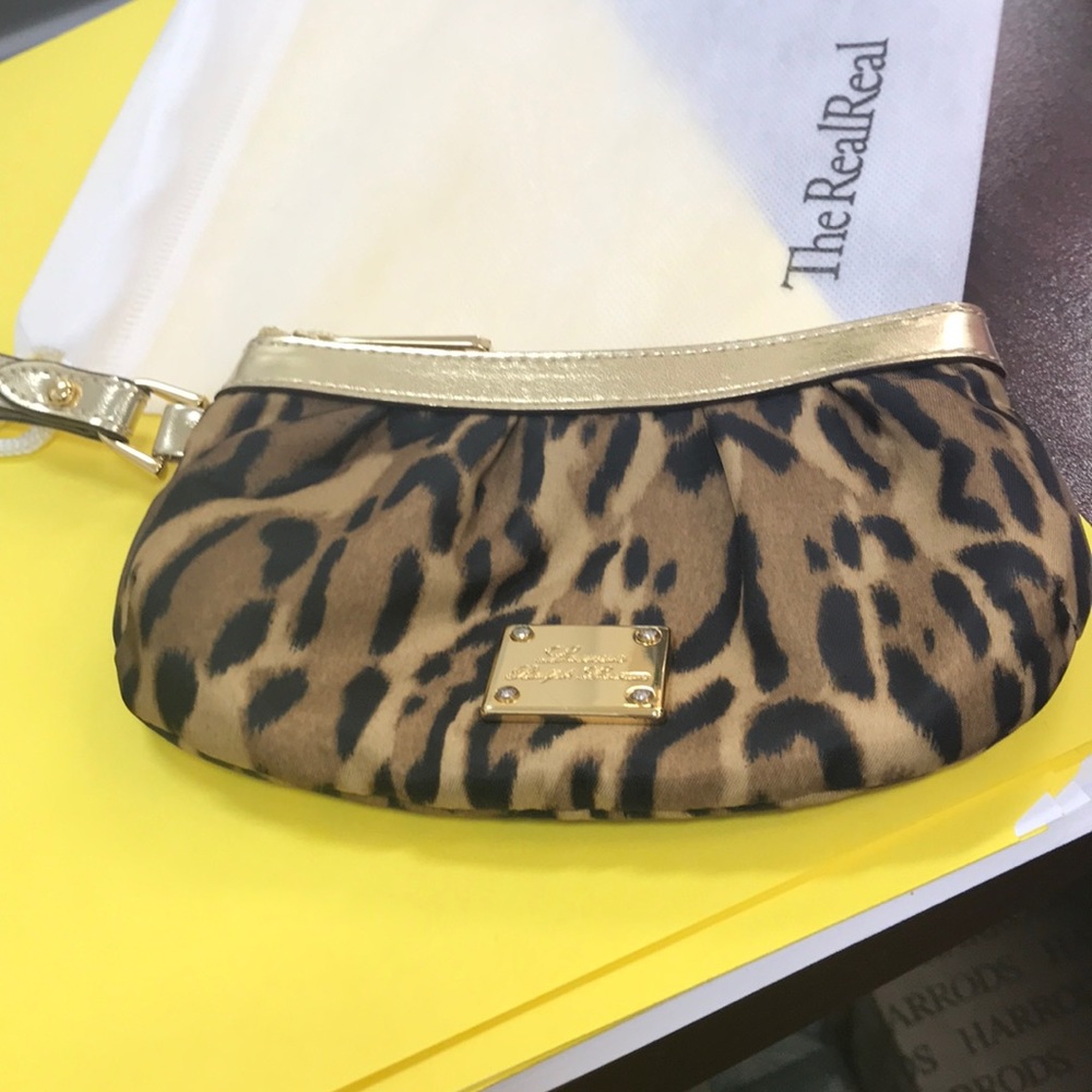 Adorable leopard print wristlet with gold leather